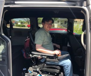 man in wheelchair inside accessible van at stephens farm. Adeo Brain Injury Services