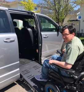 man using accessible wheelchair ramp into van at stephens farm. Adeo Brain Injury Services