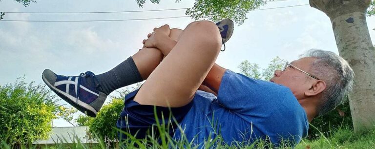 Adeo physical therapy client stretching legs